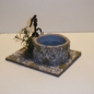 offener Brunnen mit Mauerwerk auf Wasserglas