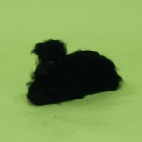 Wollschaf  liegend schwarz