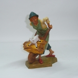 Hirte mit Sackkarre und Lamm